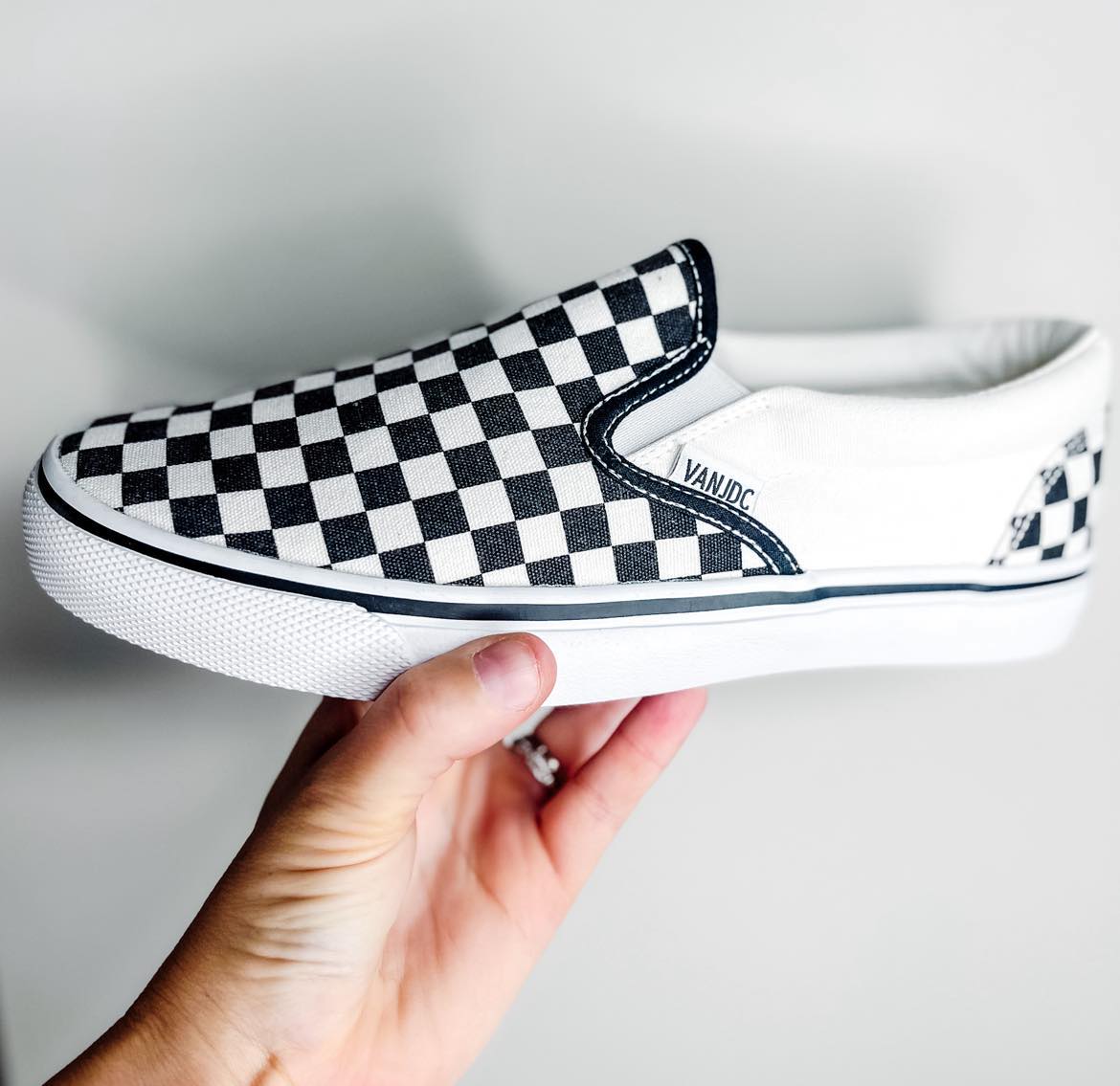 Black and White Checker Slip-ons